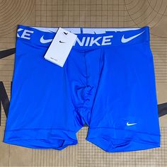 Brand New With Tags In Sealed Oem Packaging Nike Pro Dri-Fit Men's 6" Performance Boxer Brief Compression Shorts 1 Pair Blue/ White Men's Size M, L, & Xl Features Nike Dri-Fit Technology Moves Sweat Away From Your Skin For Quicker Evaporation, Helping You Stay Dry And Comfortable. Stretch Fabric Lets You Move Freely. Wide Hems Help Keep Underwear In Place. Flat Seams Feel Smooth Against Your Skin. Details 1-Pack Nike Swoosh Logo Front Left Thigh Repeated Nike Logo On Waistband Tagless No Fly 6" Blue Boxer Briefs With Built-in Shorts For Sports, Blue Brief Sports Shorts, Blue Stretch Boxer Briefs For Athleisure, Blue Stretch Boxer Briefs In Athleisure Style, Casual Blue Boxer Briefs For Workout, Blue Workout Boxer Briefs, Blue Compression Go-dry Boxer Briefs, Compression Go-dry Blue Boxer Briefs, Blue Compression Boxer Briefs With Go-dry Technology