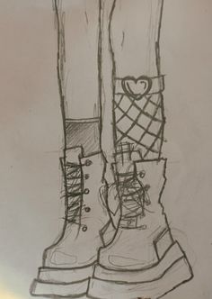 a drawing of two boots with hearts on them