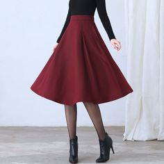 "★★ FEATURES * Wool skirt * Polyester lining * Two side seam pockets * Right zipper closure * pleated detail * Plus size full skirt * A Line Skirt * Perfect for Winter, autumn, spring * Dry clean ★★ The model is 170 cm (5′ 7″) tall with a 80 cm (31.5\") bust, 66 cm (26\") waist. She is wearing the red wool skirt in size XS. ★★ Bespoke Order Service If you Request other color Request the length Your height is not between 155 cm- 172 cm Your weight is over 75 kg I can do it for you, It will need s Retro A-line Winter Skirt, Red Pleated Skirt For Fall, Red Long Skirt For Fall, Winter Wool A-line Skirt, A-line Wool Bottoms For Winter, Fitted Wool Skirt In A Solid Color, Chic Wool Skirt For Winter, Chic Winter Wool Skirt, Red Knee-length Skirt For Fall