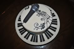 a cake with a microphone on top of it