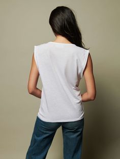 Your go-to muscle tank with extra roomy armholes and an easy, effortlessly bold silhouette. (This one comes in White.) | Women's Janis Tank Top in White | Ethical Essentials Sporty Muscle Tee With Relaxed Fit For Spring, Sporty Relaxed Fit Muscle Tee For Spring, Relaxed Fit Muscle Tee Tank In Athleisure Style, Relaxed Fit Muscle Tee Tank For Athleisure, Casual Everyday Muscle Tank Tee, Relaxed Fit Crew Neck Tank Top For Athleisure, Summer Workout Muscle Tee With Dropped Armholes, Versatile Sleeveless Muscle Tee For Summer, Spring Muscle Tee With Scoop Neck For Everyday