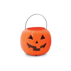 an orange pumpkin bucket with a face on it