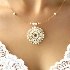 "I created this pearl pendant necklace by hand, using Swarovski pearls 3mm, Miyuki round seed beads, Miyuki Delica beads and 14k gold filled cable chain. * Measurements: Necklace length: 16.5\" (42cm) Pendant diameter: 1.18\" (3cm) * The necklace will come beautifully packaged for a gift. *All necklaces come with extension chain. *Additional information on the matching earrings you can see here: https://www.etsy.com/listing/218362925/long-pearl-earrings-pearl-bridal?ref=shop_home_active_3 * For Pearl Chain Pendant Beaded Necklace For Wedding, Delicate Beaded Pearl Necklace For Wedding, Dainty Round Bead Pearl Necklace For Wedding, Dainty Pearl Necklace With Round Beads For Wedding, Dainty Pearl Wedding Necklace With Round Beads, Dainty Round Pearl Wedding Necklace, Delicate Round Bead Necklaces For Wedding, Wedding Necklaces With Pearl Pendant And Round Beads, Dainty Pearl Chain Beaded Necklace For Weddings