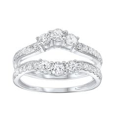 three stone diamond ring set in white gold