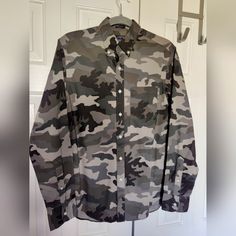 For Sale Is A Nwt J.Crew Button Down In A Grey Camo Pattern In Size Small. Very Cool Shirt That Is Too Small For Me. It Is In Brand New Condition With No Nicks Or Snags. Comes From A Pet And Smoke Free Home. Any Questions Or Measurements Feel Free To Ask. Thanks For Looking. Camouflage Long Sleeve Cotton Shirt, Long Sleeve Camouflage Cotton Shirt, Military Style Button-up Tops With Snap Buttons, Military Button-up Shirt, Military Style Button-up Tops, Camouflage Button-up Top For Fall, Fall Camouflage Button-up Tops, Military Style Shirt With Button Closure For Fall, Military Style Workwear Tops With Snap Buttons