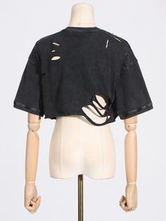 Tune into your rebellious side when you wear The DISTRESSED STUDDED SHORT SLEEVE T SHIRT ! Crafted from a semi-stretchy cotton base fabrication, this grunge-inspired top features a mineral wash finish, a mock neckline, short sleeves, a cropped silhouette with a raw hemline, and an easy pull-on fit. Complete with ultra-distressed ripped accents, cut out detailing, silver metallic pointed studs, and safety pin embellishments, successfully delivering that sought-after alternative flare. Style with a bralette, relaxed fit denim, and platform sneakers to finish off your look.Size Chart（CM）: Mock Neckline, Short Sleeve T Shirt, Platform Sneakers, Safety Pin, T Shirt Top, Bralette, Cut Out, Size Chart, Short Sleeves