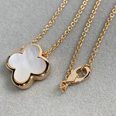 PURE CLOVER PINK GOLD MOP NECKLACE Luxury Rose Gold Flower Pendant Necklace, Luxury White Tarnish-resistant Necklace, Luxury Necklaces With Shiny Finish For Anniversary, Luxury Necklaces For Anniversary With Shiny Finish, Luxury Shiny Finish Necklaces For Anniversary, Gift Yellow Gold Jewelry With Mother Of Pearl, Luxury White Gold Plated Necklaces, Luxury Gold Pendant Pearl Necklace, Luxury Sterling Silver Necklace With Shiny Finish