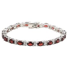 Colleen Lopez Gemstone and White Zircon Tennis Bracelet A testament to timeless elegance and refined taste, this sterling silver tennis bracelet sparkles with oval-cut gemstones and round white zircon.       S/M approx. 6-3/4"L x 1/8"W     M/L approx. 7-1/2"L x 1/8"W     Stamped .925 sterling silver; rhodium plating     Box clasp with double safety catches   Stone Information       All sizes and weights approximate     Total Carat Weight: 12ct (S/M Blue Topaz), 12.8ct (S/M Garnet), 13.2ct (M/L B Elegant Oval Cubic Zirconia Gemstones, Oval Gemstone Tennis Bracelet In Fine Jewelry Style, Classic Oval Gemstone Tennis Bracelet, Oval Gemstone Tennis Bracelet For Anniversary, Formal Oval Gemstone Tennis Bracelet, Elegant Oval Bracelets With Gemstone Accents, Classic Silver Gemstone Tennis Bracelet, Oval Cubic Zirconia Tennis Bracelet In Fine Jewelry Style, Elegant Sterling Silver Bracelet With Oval Gemstone