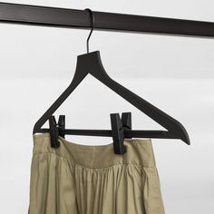 a skirt hanging on a clothes hanger