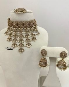 Elegant antique gold Polki Choker Set with beautiful Jhumki earrings and Tikka/Indian Jewelry/ High quality kundan Polki jewelry/trendy unique choker All items are shipped from Brampton, Ontario, Canada. If you need your item by a certain day, please reach out to us for express delivery option before placing the order so that we can update the shipping for you. Standard shipping/delivery timeline Below are the estimated delivery times after the order is shipped/dispatched.  ---> USA delivery tim Heavy Gold Plated Jewelry Sets For Festivals, Ceremonial Gold Jewelry Sets With Stone Work, Gold Kundan Jewelry Sets With Latkans, Hand-set Gold Jhumkas Bollywood Style, Gold Bollywood Hand Set Jhumkas, Gold Kundan Jhumkas For Festivals, Traditional Gold Meenakari Lehenga, Traditional Gold Lehenga With Meenakari, Bollywood Style Gold Lehenga With Meenakari