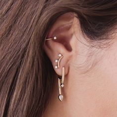 14k gold short curved bar stud earrings with three prong set round diamonds set below each barSPECIFICS • earring is approx. 12mm across• curved bar is approx. 10mm long• round diamonds are approx. 2mm each• white diamonds .18 ctw (pair), .09 ctw (single)• sold as a pair or single Round Diamond Setting, Curved Bar, Earring Drop, Gold Shorts, Bar Stud Earrings, Bar Studs, Princess Cut Diamond, Princess Diamond, Pear Shaped Diamond