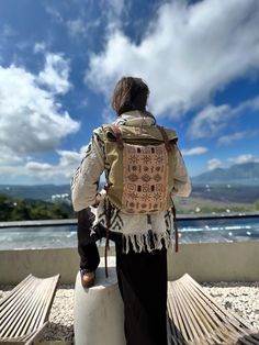 Comfy ethnic / boho / tribal style backpack made of natural canvas. Firm, durable, reliable. Decorated with embroidery by hand. It will serve you for many years. ▫️The hidden side has a pocket for your valuable items, keys and phone. Additionally there is a small pocket inside the main section. ▫️Closes with snap fasteners, two magnets on the sides. ▫️The length of the strap is adjustable. This duffel bag continues the series of shamanic clothing by «Ayaho». We aim to make unique items and care Bohemian Beige Backpack, Artisan Backpack For Travel, Traditional Rectangular Backpack For Travel, Artisan Travel Backpack, Bohemian Style Brown Backpack, Bohemian Brown Standard Backpack, Bohemian Backpack With Adjustable Strap For Travel, Traditional Travel Backpack, Bohemian Beige Rectangular Backpack