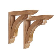 a pair of wooden brackets on a white background