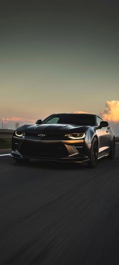 the chevrolet camaro zr1 is driving down the road