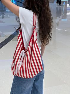 SPECIFICATIONS Brand Name: TAVIMART Types of bags: Shoulder & Handbags Main Material: CANVAS Lining Material: POLYESTER Shape: Casual Tote Hardness: SOFT Pattern Type: Striped Decoration: Bow Exterior: Silt Pocket Occasion: Versatile Closure Type: string Trendy Red Shoulder Bag For School, Red Trendy Canvas Bag For School, Casual Hobo Backpack Bag For Shopping, Casual Red Crossbody Satchel, Summer Canvas Backpack Shoulder Bag, Large Capacity Red Satchel For School, School Bucket Hobo Bag, Casual Red Canvas Bag, Casual Red Hobo Bag Shaped As Satchel