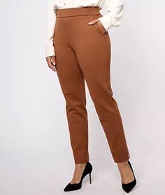 Dennis Basso Petite Ponte Pull On Slim Leg Ankle Pants Spiced Caramel Petite Small A615659. Fabrication: ponte knit Features: pull-on, angled front pockets, notch at side leg openings Rise: at the waist Fit: slim fit; contours the lines of the body Leg Shape: slim leg; fits close to the body through the entire leg Inseam: petite missy/plus inseam 26" Content: 67% rayon/28% nylon/5% spandex Care: machine wash, tumble dry Imported Slim Fit Ankle-length Work Pants, Fitted Orange Ankle-length Pants, Slim Fit Ankle-length Pants With Welt Pockets, Elastane Tapered Leg Pull-on Dress Pants, Slim Fit Elastane Ankle-length Pants, Dennis Basso, Ankle Pants, Slim Leg, Slim Legs