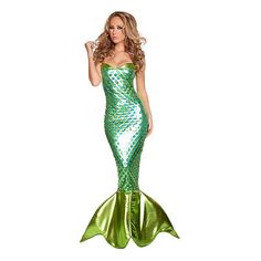 a woman in a green mermaid costume