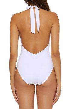 A low back brings sunny flair to this plunging one-piece swimsuit. Ties at neck Halter plunge neck Adjustable tie straps Moderate back coverage 83% nylon, 17% spandex Hand wash, line dry Imported Summer Backless One Piece With Lined Body, Summer Backless One-piece With Lined Body, Low Back Lined Swimwear, Backless Bodysuit With Lined Body For Pool, Low Back Swimwear For Poolside, Solid Color Low Back Bodysuit For Pool, Solid Color Low-back Bodysuit For Pool, Backless Stretch One Piece For Poolside, Chic Low Back Swimwear For The Pool