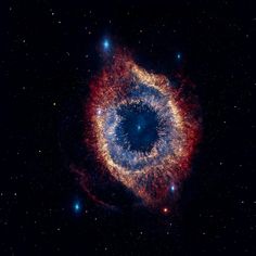 an image of a very large eyeball in the sky with many stars around it