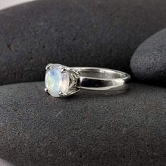 Moonstone is such a stunning stone, and this particular one is no exception. It's a bright, brilliant, 8mm clear to frosty gemstone with bright flashes of blue and rainbow hues, which is set into an airy art deco setting. The ring is custom-sized to you and I'd be happy to source another gemstone if I don't have it listed here (just send me a note!). Please contact me for larger, smaller, quarter sizes, or alternate stones. All of those options are welcome. Moonstone is June's birthstone (one of Solid Gold Bangle, Simple Band, Knuckle Rings, Herkimer Diamond, June Birth Stone, Minimalist Necklace, Gold Bangles, Gemstone Ring, Be Happy