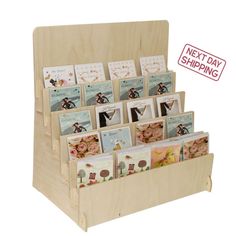 a wooden display with cards in it