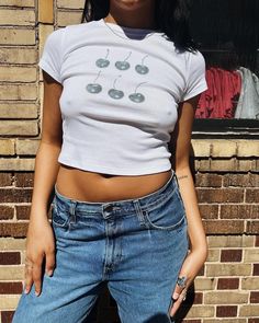 "find more designs on www.luckygirlus.com S I Z E  &  F I T ✸ Model is Wearing: Medium ✸ Height: 5'5\" ✸ Bust: 34\" ✸ Waist: 27\" BELLA + CANVAS 1010 WOMEN'S MICRO RIB BABY TEE ✸ 52% Airlume combed and ring-spun cotton, 48% polyester ✸ classic baby tee fit ✸ women's t-shirts ✸ made ethically in the U.S. ✸ designed and hand made by yours truly Coquette Baby Tees | Cherry Baby Tees | Espresso Martini Baby Tees | Cropped Graphic Tees | Martini Baby Tees | Cocktail Baby Tees | Streetwear Baby Tees" Fitted Basic T-shirt With Funny Print, 90s Style Printed T-shirt For Spring, Fitted 90s Style Crop Top T-shirt, Fitted Y2k T-shirt For Summer, Y2k Graphic Print Tops For Spring, Y2k Style Spring T-shirt With Screen Print, Trendy Printed Cotton Tops, Fitted Graphic Print T-shirt For Spring, Y2k Style Screen Print Tops For Summer