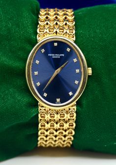 Brand: Patek Philippe Movement: hand-winding Case Material: 18K Yellow Gold Case Size: 30*35 mm Thickness: 6 mm Bracelet: 18K Yellow Gold Wrist size: Approximately 7.5 inch Dial: Blue color with Gold color hands and Hour Marks-Diamonds  Weight of the watch: 95.2 GM   Additional services such as refinishing and appraisal will be at extra cost ! We guarantee that all of our items are 100% authentic ! For additional photos and any inquiries, please send us a Direct Message ! We are official wholesalers, who have been selling for more than 2 decades ! Eligible for Paypal Credit & Affirm, If you're interested, please check if you qualify. For any questions, please feel free to send us a message.