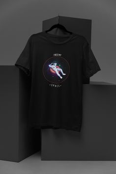 Elevate your wardrobe with our "I Need Space" t-shirt, featuring a charming spaceman floating in the vastness of space. This unique design is perfect for those who love astronomy, space exploration, or simply need a little extra room in their lives. Made from high-quality, soft cotton, this shirt offers both comfort and style. Whether you're a science enthusiast, a stargazer, or just someone who appreciates quirky, fun apparel, this t-shirt is a must-have. Ideal for casual wear, gifts, and special occasions. Available in various sizes and colours to suit your preference. High-Quality Material: Soft, durable cotton for ultimate comfort. Unique Design: Adorable spaceman graphic with "I Need Space" caption. Perfect Gift: Great for birthdays, holidays, and any special occasion. Multiple Sizes Space-themed Screen Print Short Sleeve T-shirt, Space-themed Short Sleeve T-shirt With Screen Print, Space-themed Graphic Print Cotton T-shirt, Space-themed Cotton T-shirt With Graphic Print, Space Tee, I Need Space, Space Lovers, Extra Room, Space Exploration