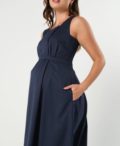 Luxury blue maternity dress with designer breastfeeding panel. Chic, flattering style to wear to the office, your baby shower, or as a wedding guest. Made with sustainable Italian designer fabric, this nursing dress is formal enough for the most professional occasion, with the femininity of a black tie party dress. Washable, petite friendly, perfect for travel, and suitable for all seasons. From the office to baby shower, Into the Blue is the best maternity clothes investment you can make. Formal Maternity Outfits, Fitted Maternity Dress Nursing Friendly, Black Tie Party Dress, Maternity Office Wear, Stretch Maternity Dress, Nursing Friendly, Blue Maternity Dress, Maternity Sleeveless Nursing-friendly Dress, Maternity Work Clothes, Nursing-friendly Sleeveless Maternity Dresses