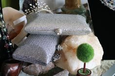 Lovely silver or gold or gray hard side metalic sides with rhinestone clasp with rhinestone clutch bag perfect your wedding or formal event! Luxury Silver Bags For Cocktail, Luxury Silver Cocktail Evening Bag, Luxury Silver Clutch For Cocktail Events, Luxury Silver Clutch For Cocktail, Luxury Silver Cocktail Clutch, Chic Silver Evening Bag For Formal Occasions, Silver Rhinestone Clutch Evening Bag, Glamorous Silver Clutch For Cocktail, Glamorous Silver Cocktail Clutch