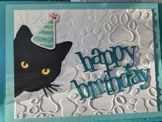 a birthday card with a black cat wearing a party hat