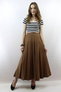 Vintage 90s High Waisted Pleated Mocha Maxi Skirt, fits size S Brown Pleated Midi Skirt Outfit, High Waist Brown Skirt, Brown Flowy Pleated Maxi Skirt, Fitted Flared Brown Mini Skirt, Fitted Brown Flared Mini Skirt, Brown Flowy Pleated Skirt For Spring, Spring Brown Flowy Pleated Skirt, High Waist Brown Maxi Skirt For Fall, Fitted Brown Pleated Skirt Bottoms