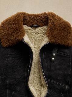 Inspired by thrill-seekers and those that run a little cooler, this warm and cozy squadron jacket is crafted from sturdy, luxurious leather with a plush wool interior.  Our designers added thoughtful details, like zip cuffs and secure pocket space to Classic Shearling Outerwear With Pockets, Rugged Brown Outerwear With Padded Collar, Rugged Leather Outerwear With Zipper Closure, Rugged Sheepskin Outerwear, Rugged Leather Jacket With Zipper For Winter, Fall Aviator Leather Jacket For Outdoors, Fall Outdoor Aviator Leather Jacket, Winter Leather Outerwear With Padded Collar, Luxury Shearling Outerwear With Pockets