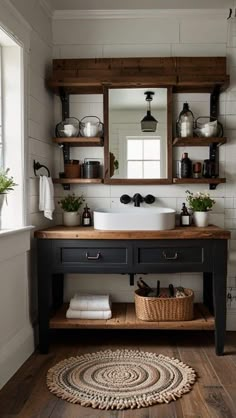 a bathroom with a sink, mirror and wooden shelves