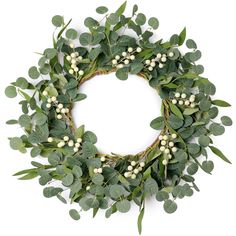 a wreath with white flowers and green leaves