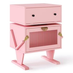 a pink cabinet with two legs and a drawer on the top that has an open door