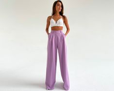 Pleated palazzo trousers in lilac. Comfortable fit at the waist, the optimal length of the trousers, there are two convenient pockets. ⭐Size: Please write your chest, waist, hips, height, and we will make a suit to your individual measurements! After you place your order, we may ask you for additional measurements. We do this to ensure that the suit fits you perfectly👌😊 ⭐Our fabric: We have used a premium quality suiting fabric. ⭐Shipping: ✈️We have two shipping options that we can offer: Free Casual Lavender Wide Leg Bottoms, Elegant Full-length Purple Bottoms, Elegant Full Length Purple Bottoms, Casual Lavender Wide Leg Pants, Lavender Wide Leg Bottoms For Summer, Lavender Wide-leg Bottoms For Summer, Lavender Wide Leg Pants, Elegant Long Purple Pants, Elegant Purple Long Pants