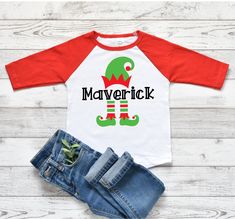 This personalized elf raglan tee is perfect for any toddler. Stylish, comfortable, and perfect for Christmas. Buy for yourself or give as the perfect holiday gift! 100% cotton 3/4 length sleeve raglan tee. Thermoflex Plus heat transfer vinyl. Don't see the colors you want? Wishing it was short sleeve? Send me a convo for a custom order! Elf Shirts, Funny Holidays, Personalized Elf, Elf Shirt, Holiday Humor, Red T Shirt, Baseball Shirt, Raglan Tee, Red Tshirt