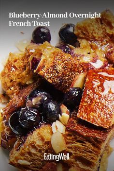 blueberry - almond overnight french toast on a white plate with text overlaying the image