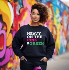 This a unisex relax fit sweatshirt made with professional heat transfer vinyl  1 x 1 rib with spandex  Double-needle stitching at shoulder, armhole, neck, waistband and cuffs  Preshrunk fleece knit Aka Sweatshirts & Hoodies, Oversized Fleece Sweats With Graphic Print, Oversized Graphic Print Fleece Sweats, Black Urban Sweatshirt With Slogan, Athleisure Slogan Sweatshirt For Streetwear, Green Hip Hop Sweatshirt With Letter Print, Green Hip Hop Style Sweatshirt With Letter Print, Green Hip Hop Crew Neck Sweatshirt, Green Graphic Print Hip Hop Sweatshirt