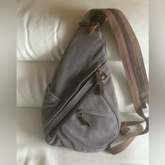 Unisex M/W Canvas Backpack/Shoulder Bag ,Nice Gray Color ,Very Comfortable For Using. L9.5”. Never Used Gray Canvas Bag With Adjustable Strap For Daily Use, Gray Portable Backpack For Outdoor, Gray Backpack Shoulder Bag, Large Capacity Gray Backpack Shoulder Bag, Gray Canvas Shoulder Bag With Adjustable Strap, Gray Outdoor Bag With Zipper Pocket, Gray Shoulder Bag With Zipper For Daily Use, Gray Shoulder Bag With Zipper Closure For Outdoor, Everyday Gray Canvas Bag With Adjustable Strap