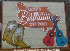 a happy birthday card with cowboy boots and guitars