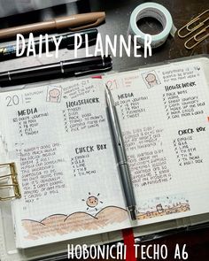 the daily planner is open and ready for someone to do their work on it,