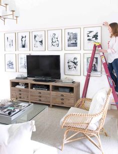 using laser level to hang art above TV Beach House Tv Wall, Tv Area Design, Grid Gallery Wall, Decorating Tips And Tricks, New Kitchen Gadgets, Tv Area, Best White Paint