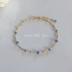 * DETAILS* This dainty bracelet is a perfect gift to the one you love or to yourself. A nice every day bracelet.  - AAA+ London Blue Topaz Faceted Beads 2-3mm & 3-4mm - 18K Gold Plated Chain  - 14k Gold Filled Spring Ring Clasp 5.5mm   - 14k Gold Filled Link Rings   👉🏻For more birthstone bracelets, see https://www.etsy.com/shop/JinnysJewelryBySeJin You may also like  🌟Sapphire Bracelet.  https://www.etsy.com/JinnysJewelryBySeJin/listing/871033001/sapphire-14k-gold-filled-dainty-bracelet?utm_s Blue Bracelet Jewelry For Birthday, Elegant Handmade Crystal Bracelet For Birthday, Elegant Sapphire Crystal Bracelet As Gift, Elegant Birthstone Crystal Bracelet For Birthday, Blue Bracelets With Gold Beads In Dainty Style, Dainty Blue Jewelry For Birthday Gift, Blue Dainty Jewelry For Birthday Gift, Elegant Round Bead Bracelets For Birthday Gift, Elegant Round Beads Bracelet For Birthday Gift