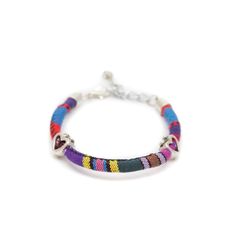 These fun, casual, and gorgeous bracelets are one of our best sellers and are perfect for adding some 'boho flair' to any outfit! Each piece features beautiful and colorful Guatemalan fabric wrapped around a bracelet that is detailed with silver beaded accents. Wear one or stack them - collect them all! As always... Handmade and Fair Trade! 7 1/2" L 100% Cotton Fabric Silver Beads and Clasp Colors/Patterns Will Vary Price is for one random Bohemian Fabric and Bead Bracelet WARNING: CHOKING HAZAR Adjustable Woven Multicolor Wrap Bracelet, Adjustable Multicolor Wrap Bracelet, Trendy Woven Beaded Bracelets For Festival, Multicolor Bangle Wrap Bracelet For Friendship, Bohemian Woven Wrap Bracelet For Festivals, Trendy Multicolor Woven Beaded Bracelets, Hippie Woven Summer Bracelets, Hippie Summer Woven Bracelets, Casual Multicolor Beaded Bracelets For Festival