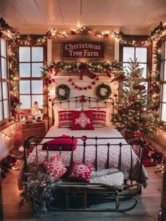 a bedroom decorated for christmas with lights and decorations