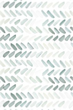 an abstract pattern made up of white and gray colors