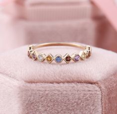 Rainbow Sapphire Eternity Band, Colorful Natural Gemstone Rings, Multi Colored Stone Rings, Stackable Mothers Ring, Birthstone Stacking Ring ✧･ﾟ: *✧･ﾟ:* Welcome to Charles Davin Jewelry*:･ﾟ･ﾟ✧ Moissanite - a gemstone known to bring in luck in someone's life, the user can give off a look of elegance. You can give your special someone luck whilst showing your love to them. ✶Material: 10K/ 14K/ 18K ✶Main Stone: Natural Sapphires and Natural Gemstones ✶Side Stone: - ✶Width of band: 1.3mm ✶Thickness Stackable Mothers Ring, Mothers Ring Stackable, Ombre Rings, Sapphire Eternity Band, Birthstone Stacking Rings, Mothers Ring, Colored Stone Rings, Rainbow Sapphires, Art Deco Diamond Rings