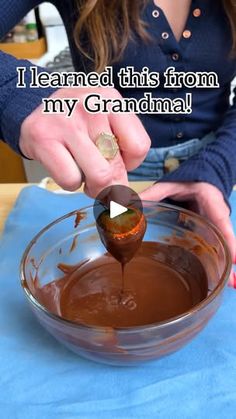 a woman is mixing chocolate in a bowl with the words i learned this from my grandma